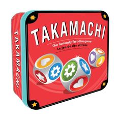 a tin box with four dices in it and the words takamachi on top