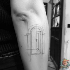 This minimalist forearm tattoo presents a partially open doorway, symbolizing new beginnings and possibilities. A perfect creative tattoo for those seeking simple yet meaningful designs. Visit inktat2.com for more inspiration. Front Door Tattoo, Door Tattoo Minimalist, Doorway Tattoos, Open Door Tattoo, Minimalist Forearm Tattoo, Doorway Tattoo, Door Tattoo, Open Doorway, Creative Tattoo