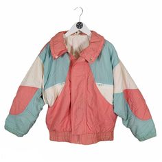 "Pastel pink, blue and white Pit to pit 22\"  Neck to hem 24\"  Pit to cuff 17.5\"" Pink Retro Patchwork Outerwear, Retro Pink Patchwork Outerwear, Pink Patchwork Retro Outerwear, Casual Pink Patchwork Windbreaker, Retro Pink Windbreaker For Winter, Retro Pink Outerwear For Outdoor, Sporty Pink Patchwork Outerwear, Pink Retro Windbreaker For Streetwear, Retro Pink Windbreaker For Streetwear