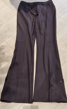 Brown John Galliano pants. The actual color is that of the last 2 photos The size label is photographed The fabric (see the photo of the label) is slightly elastic, the composition is 88% wool, 8% lycra, 8 % polyamide The size label is photographed It measures  Waist circumference 29,9 in Length 44 in From the waistband to the inseam 10,2 in Excellent condition Brown Stretch Dress Pants For Fall, Brown Full Length Business Pants, Brown Business Pants Full Length, Brown Full Length Dress Pants For Business, Brown Full-length Bottoms For Office, Fitted Brown Office Bottoms, Brown Wide Leg Business Pants, Fitted Brown Bottoms For Office, Formal Stretch Brown Bottoms