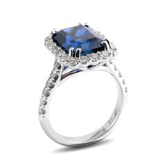 a cushion cut blue sapphire and diamond ring