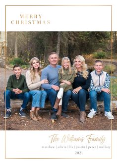 a merry christmas card with an image of a family sitting on a bench