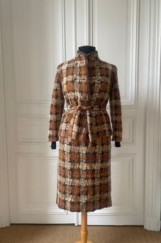 Gorgeous Color for this woven wool mohair suit, from 1960s very good condition One of a kind ! made by a French tailor in the 60s with a luxury fabric it is warm very nice shape for the skirt fits for a 36/38   FRENCH SIZE), mannequin is a size 38 and jacket is too small but please double check measures lying flat : skirt which is a 38 French size  /  WAIT  : 14 INCHES LENGTH  : 27,5  INCHES jacket which is a 36 French size  26 total high  17 armpit to armpit 15 inches shoulders 18 waist Feel un Elegant Brown Tweed Jacket For Fall, Elegant Brown Tweed Jacket For Office, Chic Fitted Brown Tweed Jacket, Chic Brown Tweed Jacket For Formal Occasions, Brown Wool Tweed Jacket For Workwear, Vintage Tailored Brown Tweed Jacket, Retro Brown Wool Tweed Jacket, Brown Retro Wool Tweed Jacket, Retro Brown Tweed Jacket For Business