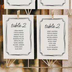 the table numbers are hanging on clothes pins