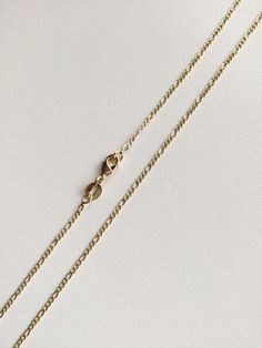 "18K GOLD FILLED CROSS NECKLACE . FOR GOOD LUCK,PROTECTION,HEALTH AND ANY KIND OF DIFFICULTY .18\" LONG CHAIN. PENDANT SIZE: 40 X 18 mm 18K GOLD FILLED CADENA DE CRUZ . PARA PROTECCION,BUENA SUERTE,SALUD Y PARA CUALQUIER CASO DIFICIL.18\" LARGO CADENA. TAMANO DEL DIJE: 40 X 18 mm" 14k Gold Figaro Chain Pendant Necklace, Gold Charm Necklace With Figaro Chain In 14k Gold, Gold Plated Gold Charm Necklace With Curb Chain, 14k Gold-filled Jewelry With Figaro Chain, Gold 14k Gold-filled Curb Chain Jewelry, Dainty Gold Jewelry With Curb Chain, 14k Gold-filled Charm Necklaces With Figaro Chain, Yellow Gold Charm Necklaces With Figaro Chain For Gifts, 14k Gold-filled Charm Necklace With Figaro Chain