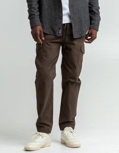 RSQ Twill Jogger Pants. Cotton twill 4-way stretch pants. Elastic drawstring waist. Slant hand pockets. Small right side zip pocket. Back right welt button pocket. Tapered jogger fit. Elastic cuffs. Approx. outseam: 40.5". 97% Cotton 3% Spandex. Machine wash. Imported. Casual Brown Full Length Bottoms, Utility Long Pants For Fall, Brown Relaxed Fit Casual Bottoms, Fall Utility Long Pants, Casual Brown Relaxed Fit Bottoms, Brown Tapered Leg Bottoms With Cargo Pockets, Utility Cotton Work Pants With Elastic Waistband, Brown Relaxed Fit Cargo Bottoms, Casual Bottoms With Belt Loops For Fall