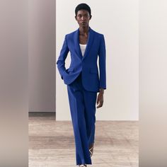 Zara Flared Pants. Never Worn Fitted Pantsuit With Welt Pockets For Spring, Fitted Spring Pantsuit With Tapered Leg, Fitted Tapered Leg Pantsuit For Spring, Blue Straight Leg Spring Pantsuit, Chic Tailored Blue Pants, Blue Straight Leg Pantsuit For Spring, Fitted Wide Leg Suits With Pockets, Fitted Wide-leg Suits With Pockets, Fitted Blue Pants For Spring