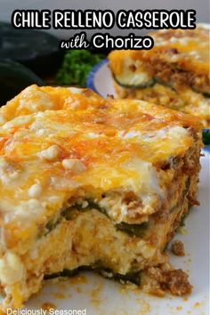 two pieces of cheesy casserole sitting on top of a white plate