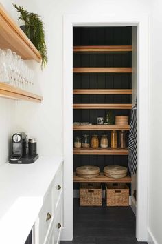 the pantry is stocked with spices and condiments for guests to drink from them