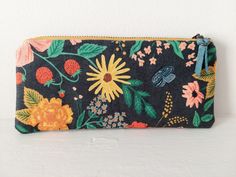 an image of a floral purse on a white background