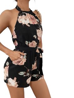 This Floral Backless Belted Romper is a stylish and versatile addition to your wardrobe. Featuring an all-over floral pattern in black, this boho-inspired romper is perfect for any occasion. The belted waistline cinches in your curves, while the tie-back and pocket details give it a modern edge. Made from lightweight polyester fabric with non-stretch properties, this piece will keep you comfortable all day long without compromising on style. Plus, with its easy care instructions, you can machine Spring Floral Print Jumpsuits And Rompers For Date Night, Summer Vacation Jumpsuits And Rompers With Belt, Belted Jumpsuits And Rompers For Spring Vacation, Floral Print Jumpsuits And Rompers For Date Night, Bohemian Jumpsuits And Rompers With Tie Waist For Spring, Summer Floral Print Jumpsuits And Rompers For Date Night, Black Summer Jumpsuits And Rompers With Tie Waist, Black Summer Jumpsuit With Tie Waist, Black Bohemian Jumpsuits And Rompers For Beach