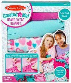 the package contains two girls in pink and blue outfits, one is wearing a heart - shaped