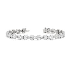 A remarkable find. This diamond tennis bracelet is something you can pass down from generation to generation. The pattern of alternating oval and cushion diamonds give this bracelet a specially stunning look. Generation To Generation, Infinity Pendant, Diamond Tennis Bracelet, Diamond Gift, Cushion Diamond, Eternity Ring Diamond, Tennis Bracelet Diamond, Fancy Color Diamonds, Gold Platinum