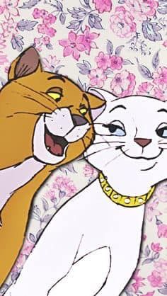 an image of two cats that are touching each other's faces with flowers in the background