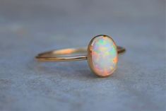 Gold Opal Ring Opal Ring Gold Ring Delicate Gold Ring | Etsy Nickel Free Elegant Opal Ring, Elegant Nickel Free Opal Ring, Dainty 14k Gold Solitaire Opal Ring, Nickel-free Elegant Round Opal Ring, Nickel-free Elegant Opal Ring, Handmade 14k Gold Opal Ring, Dainty 14k Yellow Gold Opal Ring, Elegant Nickel-free Opal Ring, Elegant Nickel-free Opal Ring For Gift