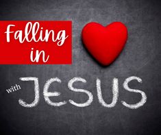 a red heart sitting on top of a blackboard with the words falling in jesus