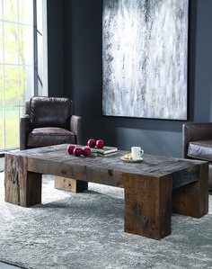 a living room with two chairs and a coffee table in front of a large painting