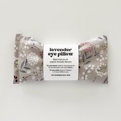 Relax with our soothing Lavender Aromatherapy Eye Pillow. Beautifully packaged with directions for use! These weighted and naturally scented eye pillows make the best gifts! Measures approximately 8” X 4” Made with 100% cotton, rice and organic lavender flowers. You can use our eye pillows for: HeadachesMigrainesTensionMeditationYoga SessionsAllergiesDry EyesAnxietyDepressionStressRelaxationSleepDark CirclesPuffy EyesCold Packs *Pattern and positioning on fabric may vary. INSTRUCTIONS: Use warm Lavender Packaging, Weighted Eye Mask, Lavender Eye Pillow, Body Mousse, Sinus Pain, Lavender Eye, Lavender Eye Pillows, Lavender Aromatherapy, Reduce Swelling