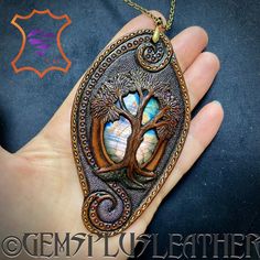 Artisan Hand-tooled Necklace For Gift, Hand Painted Spiritual Jewelry For Festivals, Spiritual Hand Painted Jewelry For Festivals, Unique Hand-painted Copper Jewelry, Unique Hand Painted Copper Jewelry, Unique Tree Of Life Jewelry Gift, Unique Tree Of Life Round Pendant Jewelry, Labradorite Jewelry Gift, Brown Labradorite Jewelry For Gift