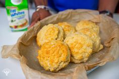 some biscuits are sitting on a paper plate