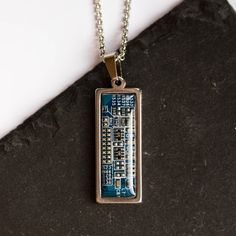 a necklace with a circuit board printed on it