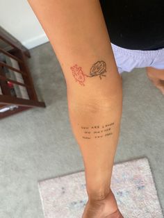 a person with a tattoo on their leg