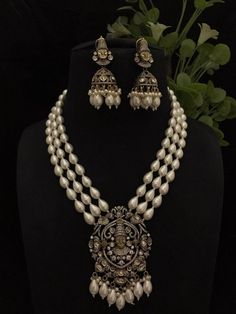 Very Gorgeous and elegant Cz stone Necklace with Matching  Earrings Versatile. Can be  paired with number of outfits. Perfect to wear at weddings occasions. Highest quality and craftsmanship Please let me know if you have any questions Silver Jeweled Kundan Temple Necklace, Silver Jeweled Temple Necklace For Festivals, Silver Jeweled Kundan Necklace In Temple Style, Festival Chandbali American Diamond Necklaces, Elegant Jeweled Temple Necklace With Chandbali Shape, Elegant Jeweled Temple Necklace In Chandbali Style, Elegant Jeweled Chandbali Temple Necklace, Silver Temple Jewelry Sets Jeweled, Elegant Kundan Necklace With American Diamond For Festivals