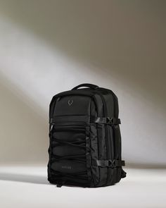 Make a seamless transition from weekdays to weekends with our Discovery Backpack. Offering a generous 28L packing capacity for work, play and every journey in between, the streamlined back-sleeve slots over your suitcase handle for hands-free carrying. Crafted from fully recycled polyester, this lightweight and durable travel companion features twisted ripstop reinforcement, ensuring it withstands the rigors of daily travel and water-resistant protection for peace of mind in wet weather. Designe Functional Nylon Luggage For Commuting, Versatile Nylon Business Luggage, Functional Business Nylon Backpack, Black Nylon Backpack With Luggage Sleeve, Black Standard Backpack For Trips, Versatile Nylon Backpack For Business, Black Standard Backpack For Commuting, Business Nylon Backpack Luggage, Versatile Business Backpack In Nylon