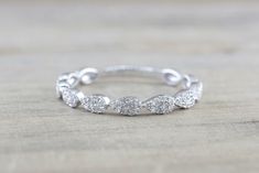 a white gold wedding band with diamonds