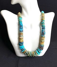 This is a genuine Kingman Turquoise bead necklace. The Turquoise beads natural and genuine Turquoise and are from the Kingman mine located in Arizona. The beads are graduated sizes from 5mm - 14mm. The necklace is 19" long with a 4" extension chain to adjust to 23" total length. It is finished with sterling silver end caps and closed with a lobster clasp. Necklace weighs 415 carats, 83 grams. Thanks for looking and check out more items in my Etsy shop for more great items and deals! https://www. Adjustable Artisan Turquoise Single Strand Necklace, Adjustable Round Turquoise Beaded Necklaces, Adjustable Round Turquoise Artisan Necklace, Adjustable Artisan Turquoise Round Necklace, Adjustable Turquoise Necklace With Round Natural Stones, Artisan Adjustable Turquoise Necklace, Adjustable Turquoise Necklace With Natural Round Beads, Artisan Adjustable Round Turquoise Necklace, Adjustable Turquoise Necklace With Natural Stones