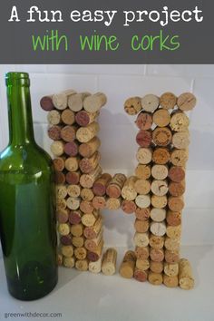 a wine bottle and cork letters with the words fun easy project