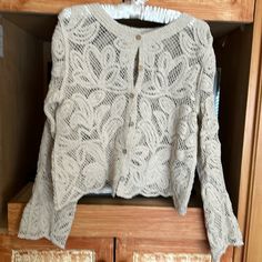 Brand New Beige Crocheted Cardigan. Poly/Spandex, Size Medium. 5 Buttons And Beautiful Scalloped Bottom. Never Worn. The Sweater Is 19” Long And 37 Wide. Crocheted Cardigan, Large Cardigan, Rib Knit Cardigan, Shrug Cardigan, Orange Sweaters, Small Sweater, Wrap Cardigan, V Neck Cardigan, Knit Sweater Cardigan