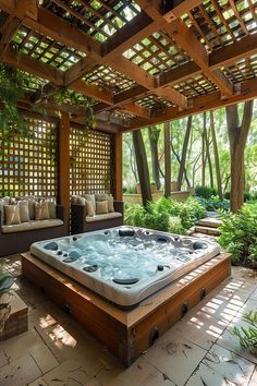 Peaceful hot tub setup with open lattice roof and lush plants, providing a tranquil and private spa experience. Jacuzzi Pool, Backyard Spa