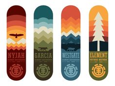 four snowboards with different designs on them