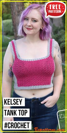 a woman with purple hair wearing a pink crop top