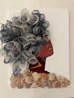 a woman's head made out of mesh and seashells in front of a white background