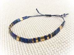 Flat Tila Bead Bracelet Navy Blue and Gold 08 - Etsy Adjustable Blue Friendship Bracelets With Gold Beads, Modern Blue Handmade Beaded Bracelets, Modern Handmade Blue Beaded Bracelets, Handmade Modern Blue Beaded Bracelets, Adjustable Blue Rectangular Bracelets, Angel Baby Ornament, Navy Blue And Gold, Beautiful Color Combinations, Baby Ornaments