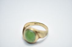 - vintage - tested 10k Gold - green aventurine - stone measures approx: 12mm x 10mm - weighs 4.4 grams - size 8 Green Oval Heirloom Signet Ring, Heirloom Green Oval Signet Ring, Vintage Green Aventurine Jewelry, Vintage 14k Gold Emerald Oval Cabochon Ring, Vintage 14k Gold Oval Cabochon Emerald Ring, Vintage Oval Untreated Emerald Ring, Vintage Untreated Oval Emerald Ring, Green Oval Signet Ring Collectible, Vintage Oval Natural Emerald Ring