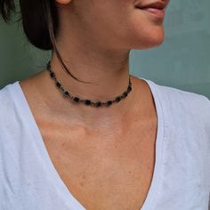 "Dainty Black Squares Chain Rock Style Statement Stacking Choker Necklace, Geometric Metal Jewelry ----------------------------------------------------------------------------------- A super trendy geometric choker necklace! Get the modern rock style look with this fashionable piece of jewelry. The ultimate stacking choker can be paired with so many different necklaces. Comes in an elegant combination of silver chain and black metal square-shaped elements. Simple yet versatile, it will become yo Adjustable Black Chain Choker, Adjustable Black Chain Necklace, Black Gothic Jewelry With Beaded Chain, Black Gothic Choker With Adjustable Chain, Metal Choker With Black Beads, Black Choker With Adjustable Chain As Gift, Black Chain Choker As Gift, Black Metal Jewelry With Adjustable Chain, Adjustable Black Clavicle Chain Necklace