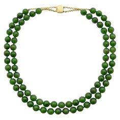 This dark green two-strand nephrite jade necklace is from Early 20th century. The necklace consists of 78 nephrite mottled jade stones. The jade strands are strung with these beautiful round beads, and to keep some nice space between the beads, the green thread is knotted in between. The gold plated 925 sterling silver closure is beautiful engraved and the chain links keeps the clasp and strands together. The jade has a beautiful dark translucent mottled color. This necklace is in very good condition and defined as quality A. The diameter of the beads is approximately 9.0 mm and the length of the necklace is 49 centimeters. The jade necklace has a nice heavy weight of 126.5 grams. We will wrap the necklace beautifully in a black and gold jewelry box. Black And Gold Jewelry, Gold Jewelry Box, Nephrite Jade, Jade Necklace, Jade Stone, Jade Beads, Multi Strand Necklace, Multi Strand, Early 20th Century