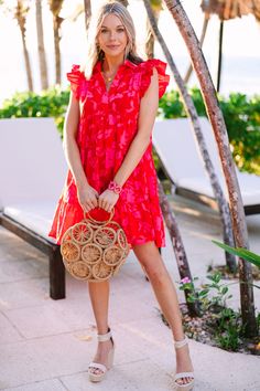 Feel your best in this sweet and girly Worth Your While Red Babydoll Dress. Featuring a floral print, babydoll silhouette and ruffled cap sleeves, you'll love the effortless style and comfortable fit of this dress. Collared v-neckline Ruffled cap sleeves Babydoll fit Floral print No stretch Cam is wearing the small. Red Ruffle Hem Dress For Vacation, Red Summer Dress With Ruffle Hem, Red Ruffle Sleeve Summer Dress, Red Flutter Sleeve Summer Dress, Red Flutter Sleeve Beach Dress, Red Flutter Sleeve Dress For Beach, Red Babydoll Dress, Mint Julep Boutique, Model Fits