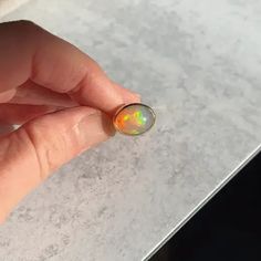 One of a kind STUNNING opal ring. Band and and backplate are solid 18k yellow gold, bezel is 22k solid gold. Incredible, flashy opal. Size 6.5 and cannot be sized. #opalaesthetic Yellow Gold Ethiopian Opal Ring In Oval Cabochon Shape, Yellow Gold Ethiopian Opal Oval Cabochon Ring, Ethiopian Opal Oval Cabochon Ring In Yellow Gold, Yellow Gold Opal Ring With Cabochon, Gold Ethiopian Opal Cabochon Ring, Gold Ethiopian Opal Ring With Oval Cabochon, Gold Opal Ring Oval Cabochon, Opal Gold Ring, Unique Opal Ring