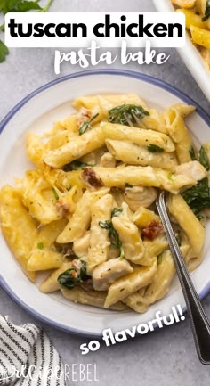 a white plate topped with pasta and chicken