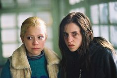 two young women standing next to each other