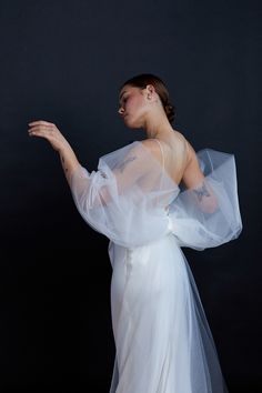 Stunning oversized bow belt in tulle with a silk satin sash. Use it as a fashion statement, as a belt, as a veil, as a shawl! Made to measure with snap closure. Light ivory tulle. Specify waist measurement in 'Notes' section at checkout. Allow 4-5 weeks from placing the order, for production. This is a made to order piece. There will be slight variances from piece to piece due to the nature of handmade items. Photos by Jennifer Cole Rodriguez & Sawyer Baird / Makeup by WINK / Hair by Katie Manselle of Culture Hair Studio / Gowns from Gilded Bridal Tulle Bow, Special Occasion Jewelry, Tulle Bows, Satin Sash, Bow Belt, Light Ivory, Bride Gowns, Fine Art Wedding Photography, Hair Studio