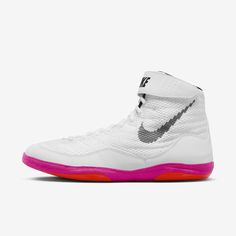 the nike zoom basketball shoe is white and pink