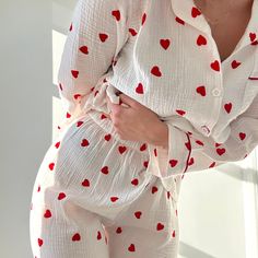 The perfect blend of romance and relaxation Fall in love with the charming heart-patterned design that adorns our Lover's Pajama Women's Loungewear Set. A visual symphony of affection, perfect for cozy nights and lazy mornings. These pajamas aren't just sleepwear; they're a matching ensemble designed for unforgettable moments. The cutest trouser matching pj set. Dive into comfort with the matching pajamas, featuring a trouser pajama that seamlessly combines style and ease. Our Lover's pjs are cr Cotton Pyjama Set, Cute Aesthetic Pajamas, Aesthetic Pj Outfits, Nightsuits For Women, Cute Pyjama Sets, Cute Pjs Aesthetic, Pijama Aesthetic, Pjs Ideas, Pyjamas Aesthetic