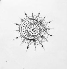 a black and white drawing of a sunflower with arrows in the center on paper