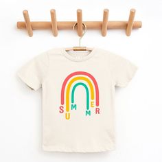 Looking for a cute tee for your kids? We have the perfect Rainbow Summer graphic tee addition to their closet! Also available in toddler tees. Trendy Spring Playtime T-shirt, Cute Letter Print T-shirt For Playtime, Casual Letter Print T-shirt For Playtime, Screen Print Short Sleeve T-shirt For Playtime, Playful Rainbow Graphic Print T-shirt, Trendy Rainbow T-shirt For Summer, Funny Print Tops For Summer Playtime, Trendy Rainbow Summer T-shirt, Spring Letter Print T-shirt For Playtime