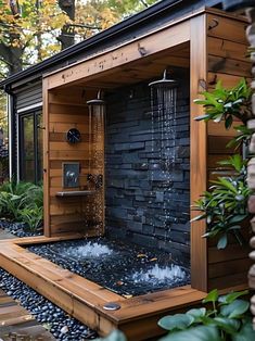 an outdoor shower with water coming out of it